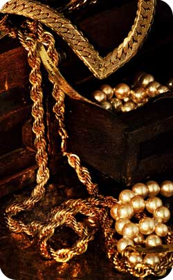 gold jewellery and chains to represent the golden wedding Golden wedding 50 year wedding anniversary