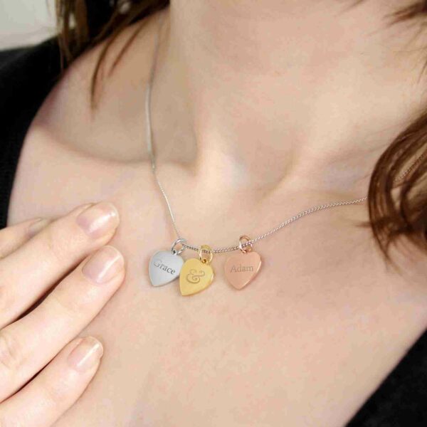 Couple's Names Gold Rose Gold and Silver 3 Hearts Necklace example shown on a model