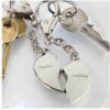 Two Hearts Beat As One Keyring engraved with snugglebutt and cuddlebug