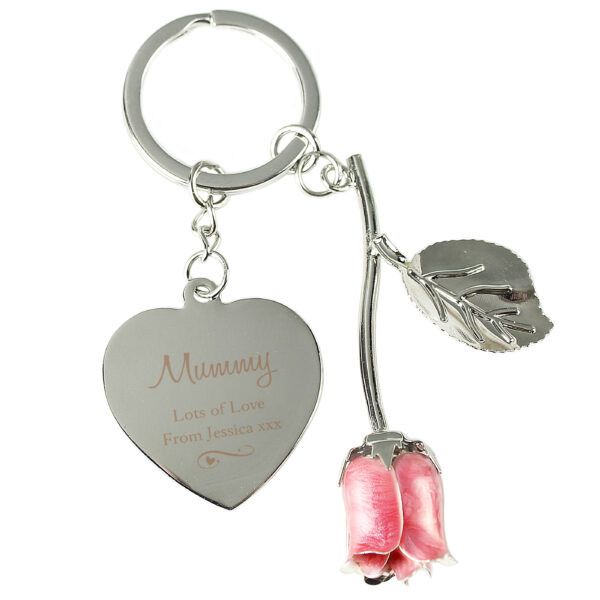 Silver Plated Swirls & Hearts Pink Rose Personalised Keyring This Personalised Swirls & Hearts Pink Rose Keyring is a suave and sophisticated gift for her! This keyring can be personalised with a name up to 12 characters and 2 lines of text, with up to 20 characters per line. All personalisation is case sensitive and will appear as entered. Please avoid entering the name in block capitals, as this may make it difficult to read. The keyring is presented in a black box, with a clear plastic front. This item is silver plated. Ideal for Valentine's Day, Mother's Day, Birthdays. Please double check your personalisation as how it appears here will be how it appears on the product, including spacing and punctuation. Please do not include accents and special symbols as some of our processes will not allow this. Despatched within 1-3 Days of order, Available for Next Day Dispatch Height 14.5 cm Width 3.2 cm Depth 1.2 cm