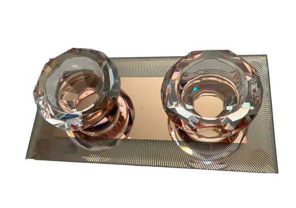 Glass Tea Light Holders on a copper coloured mirrored glass tray